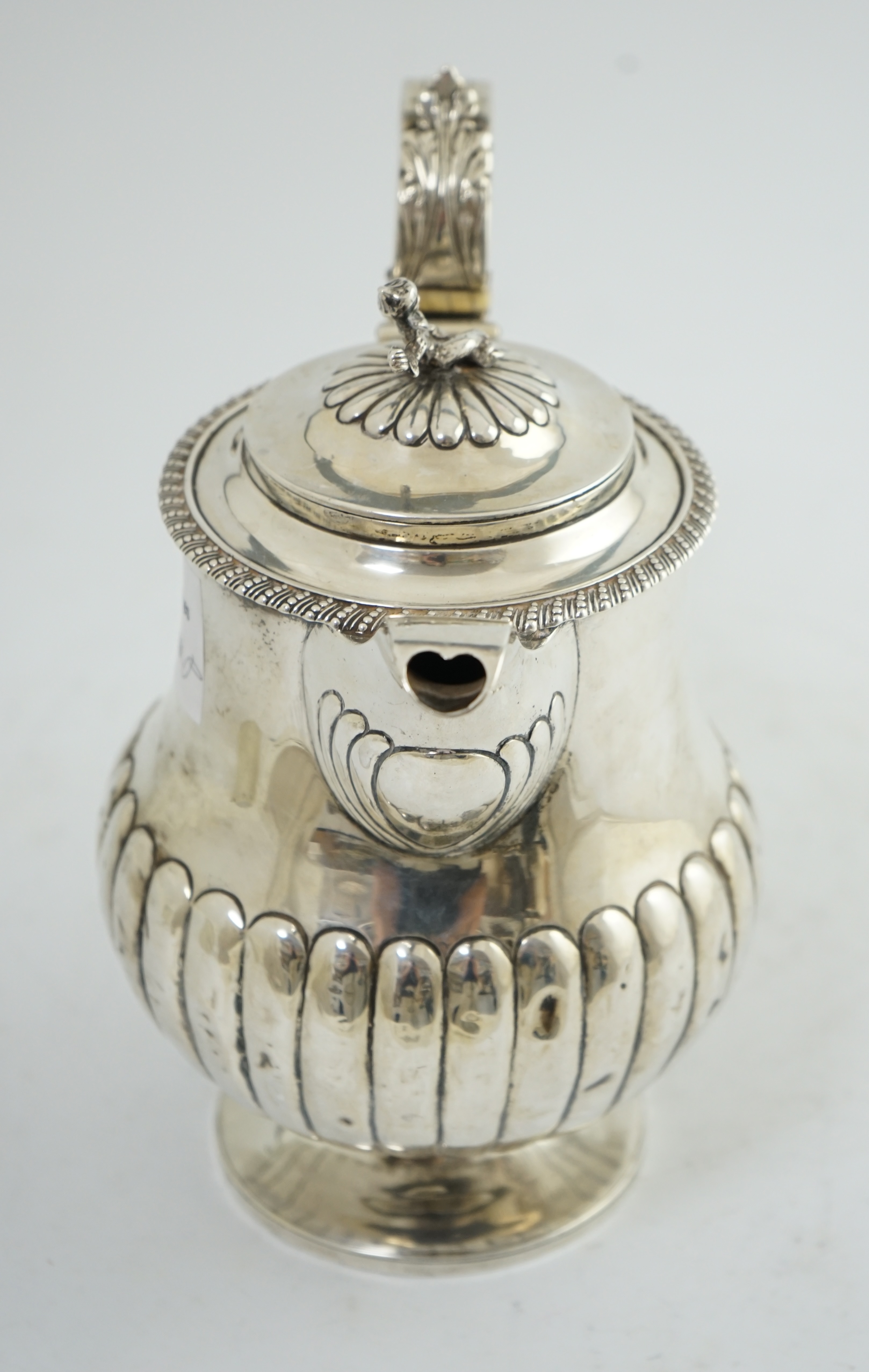 A George IV demi-fluted silver hot water pot, by Michael Linsey?